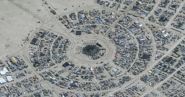 Desert downpours dampen spirits of Burning Man festival in Nevada