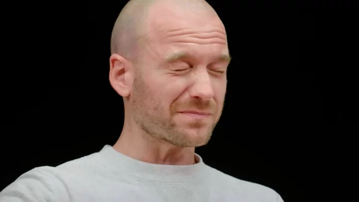 Watch 'Hot Ones' host Sean Evans taste test the new world's hottest pepper