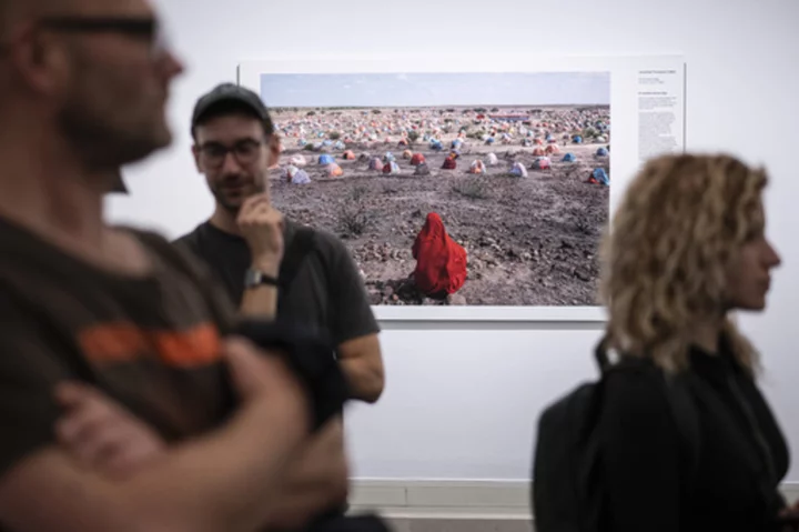 Hungary bans teenagers from visiting World Press Photo exhibition over display of LGBTQ+ images