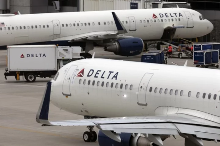 Delta Air Lines is soaring to a record $1.8 billion profit as summer vacationers pack planes