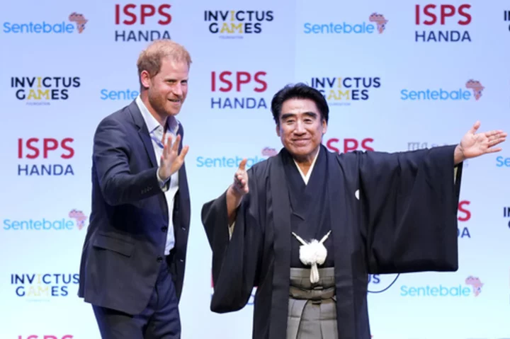 Prince Harry lauds the healing power of sports as he kicks off a promotional tour of Asia in Tokyo